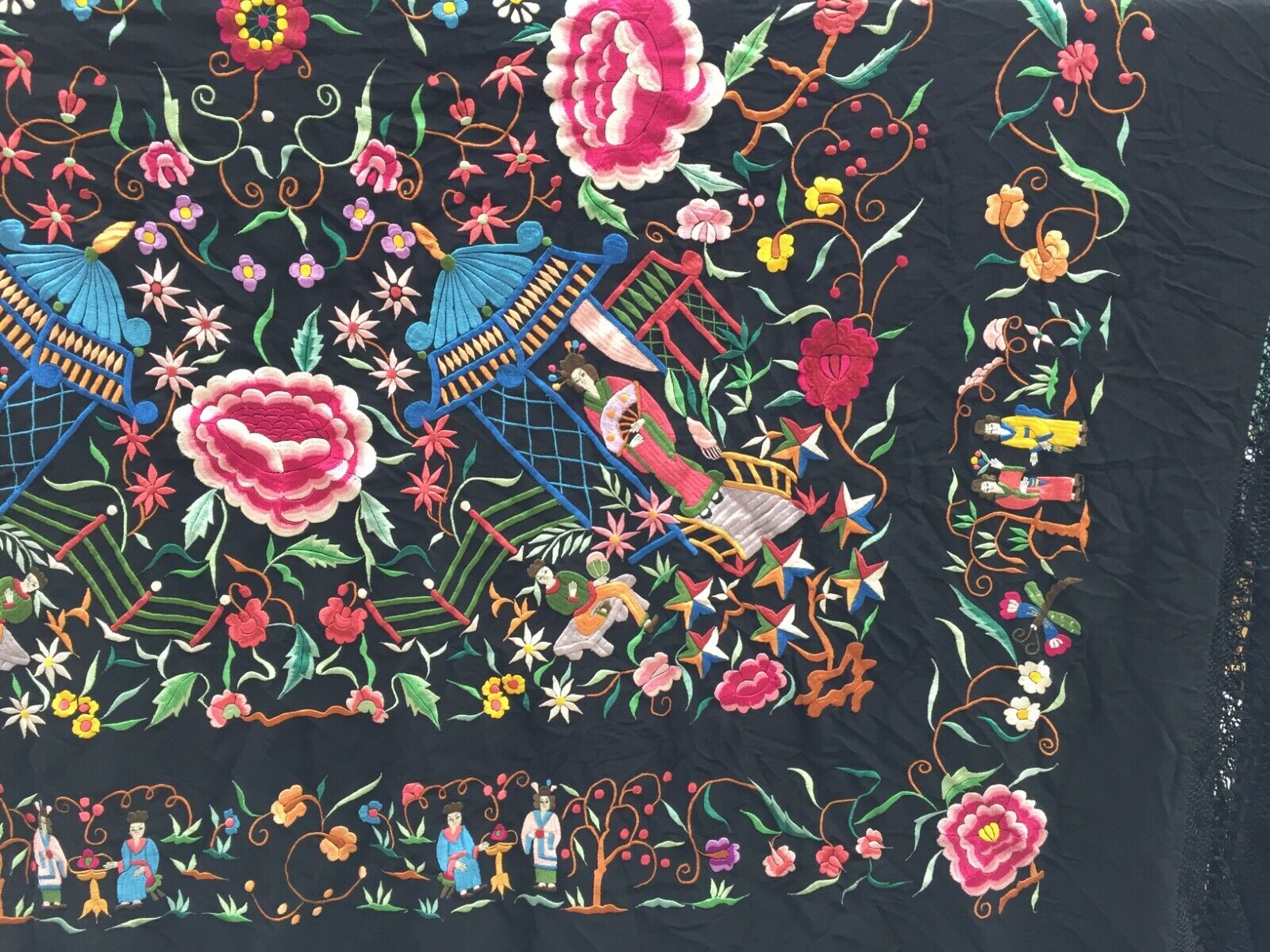 Overhead shot of the shawl showcasing its square shape and dimensions
