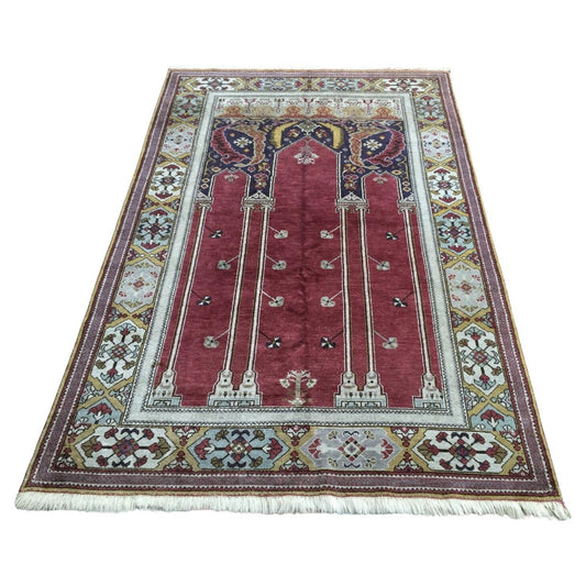 Handmade Vintage Turkish Konya Rug showcasing intricate traditional designs in rich warm red, cream, blue, and golden hues