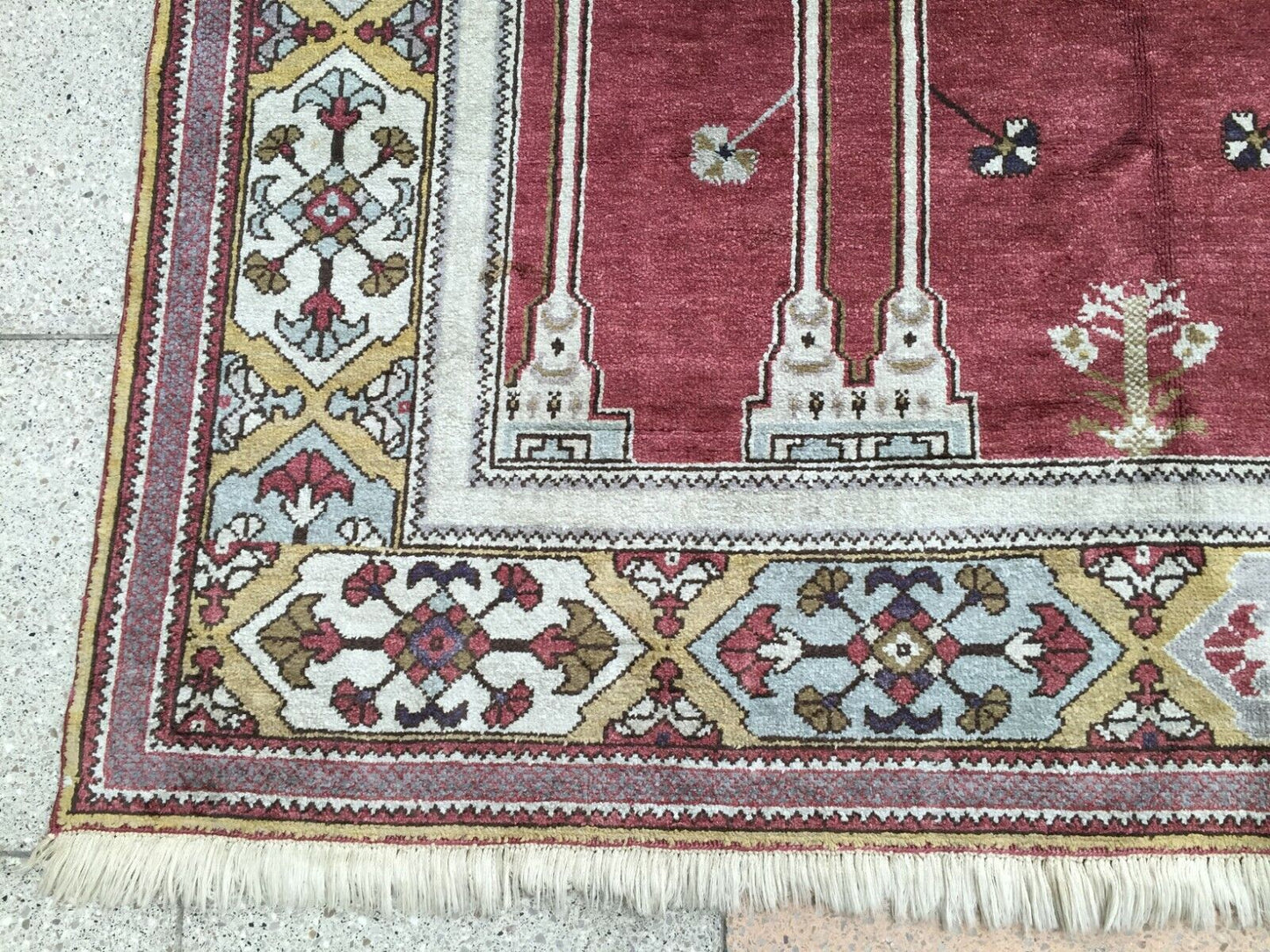 Side angle view of the rug, capturing its size and vibrant colors