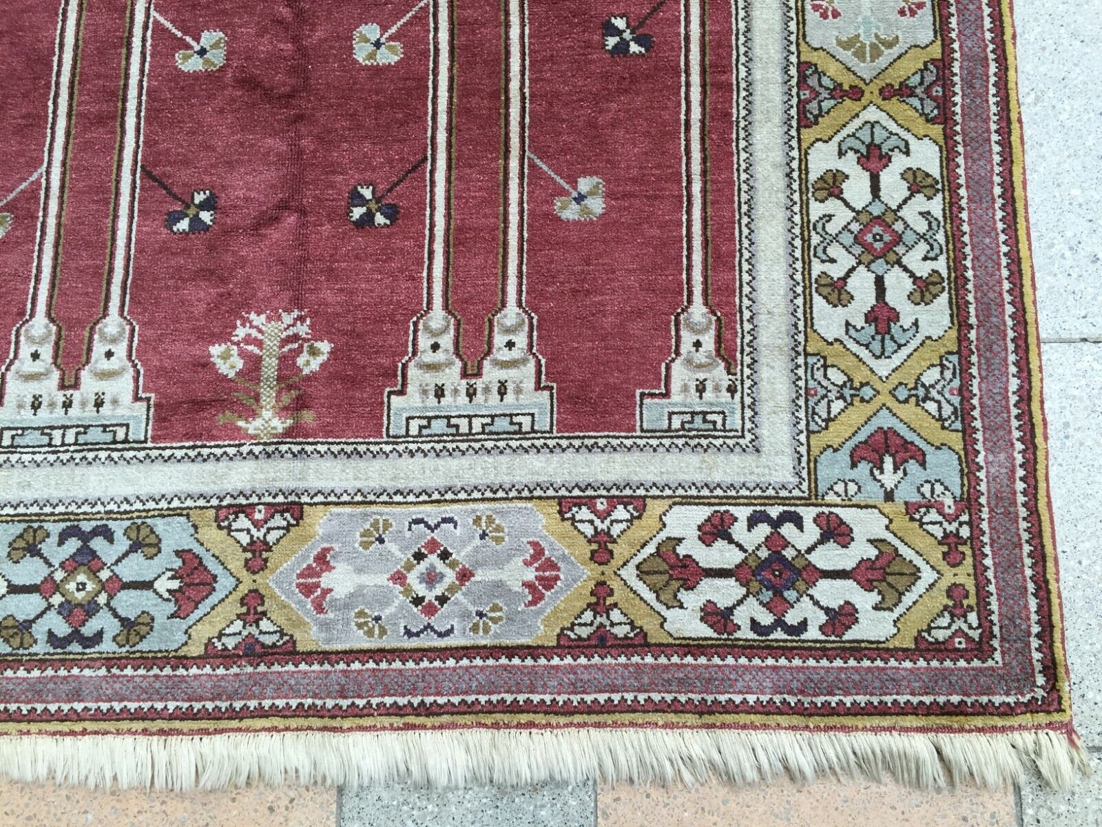 Overhead shot of the rug displaying its symmetrical patterns and design details