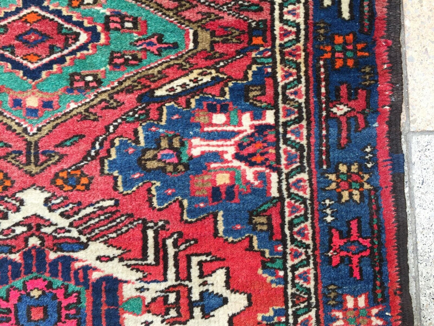 Intricate Red, Blue, and Green Designs Adorning Surface of Handmade Hamadan Rug - 1960s