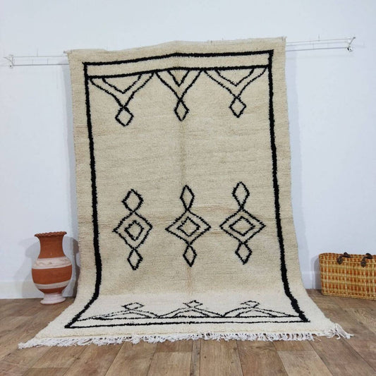 Close-up detail of woven wool and tribal diamond motif

