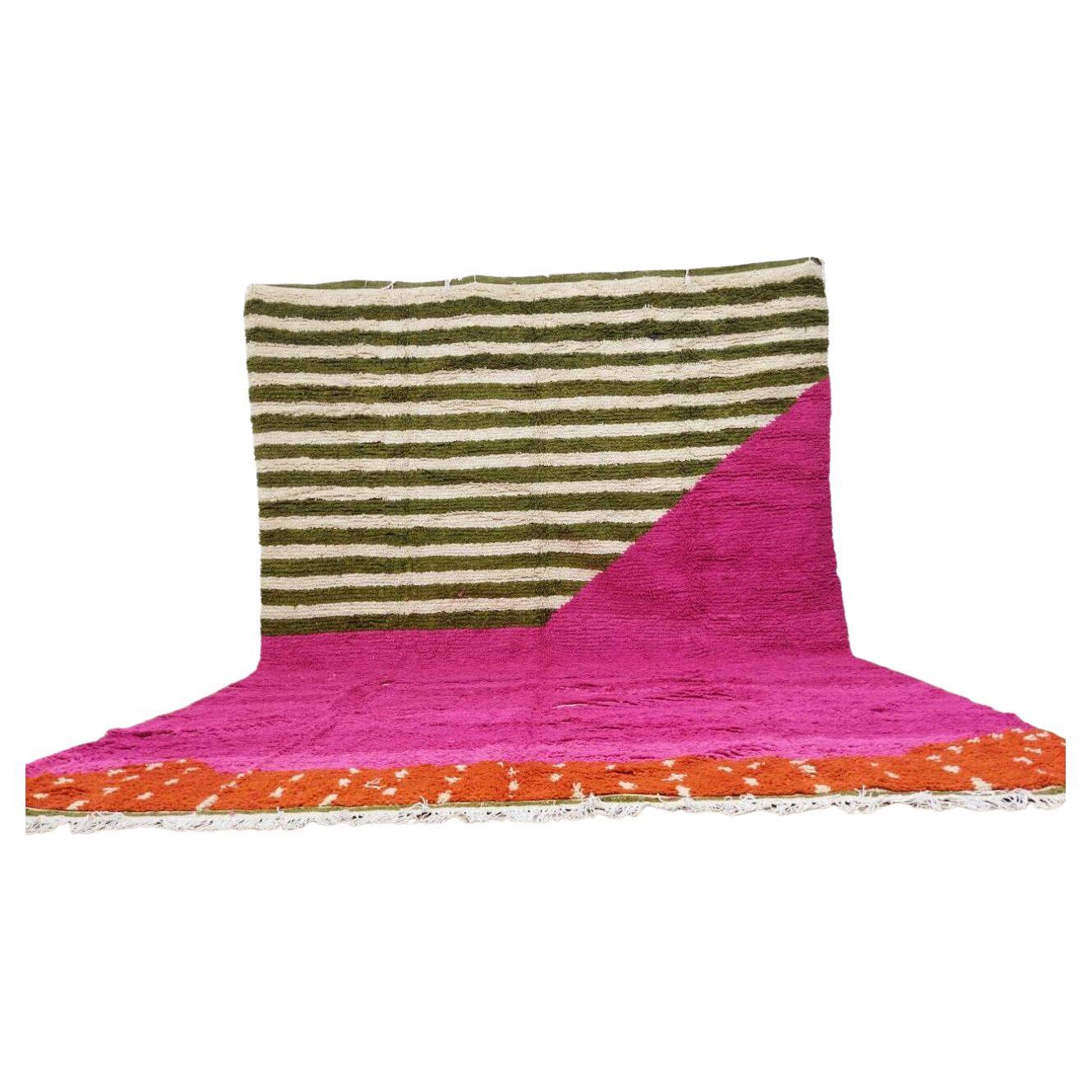 Large vintage Moroccan Berber rug with green-white bands and pink triangle

