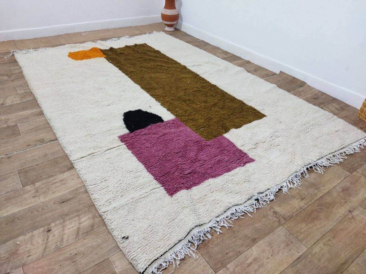 Vivid orange form woven in dense wool pile detail

