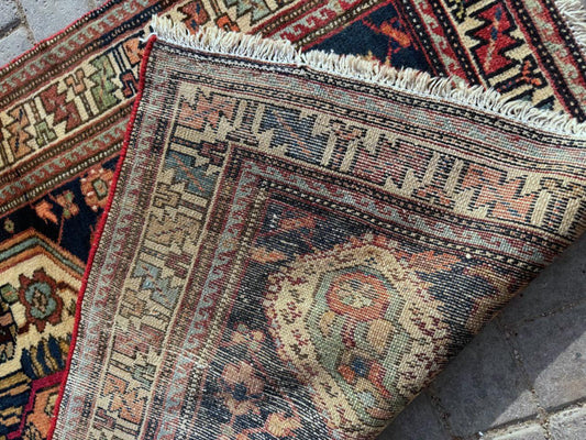 Complex medallion detail with tribal geometric elements


