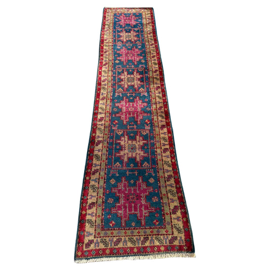 Vintage Caucasian Kazak runner with geometric medallions


