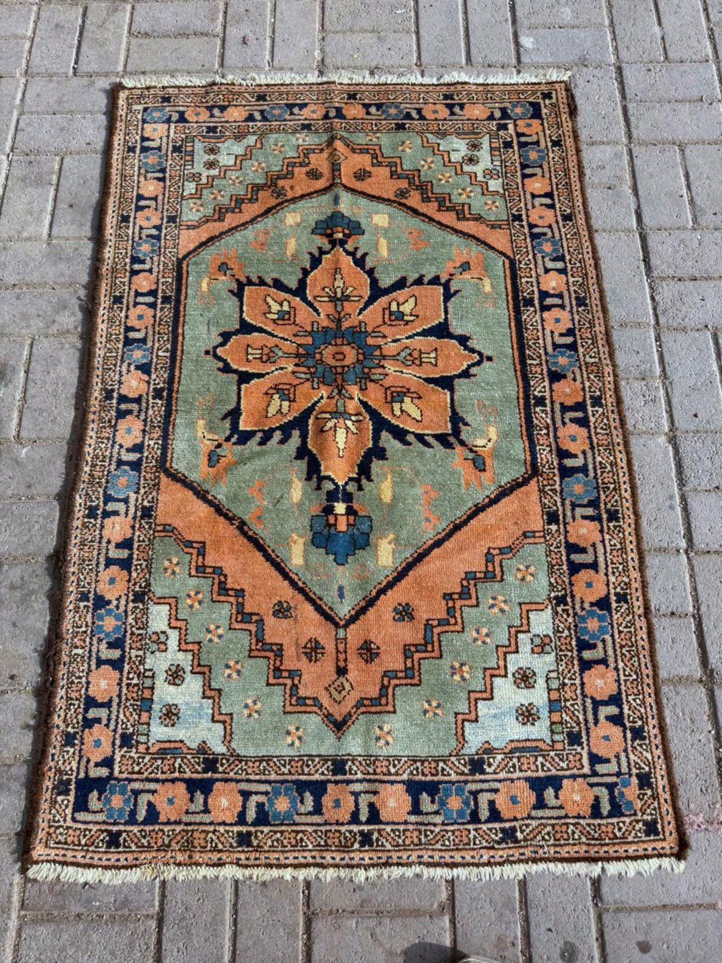 Navy blue geometric accents in border design


