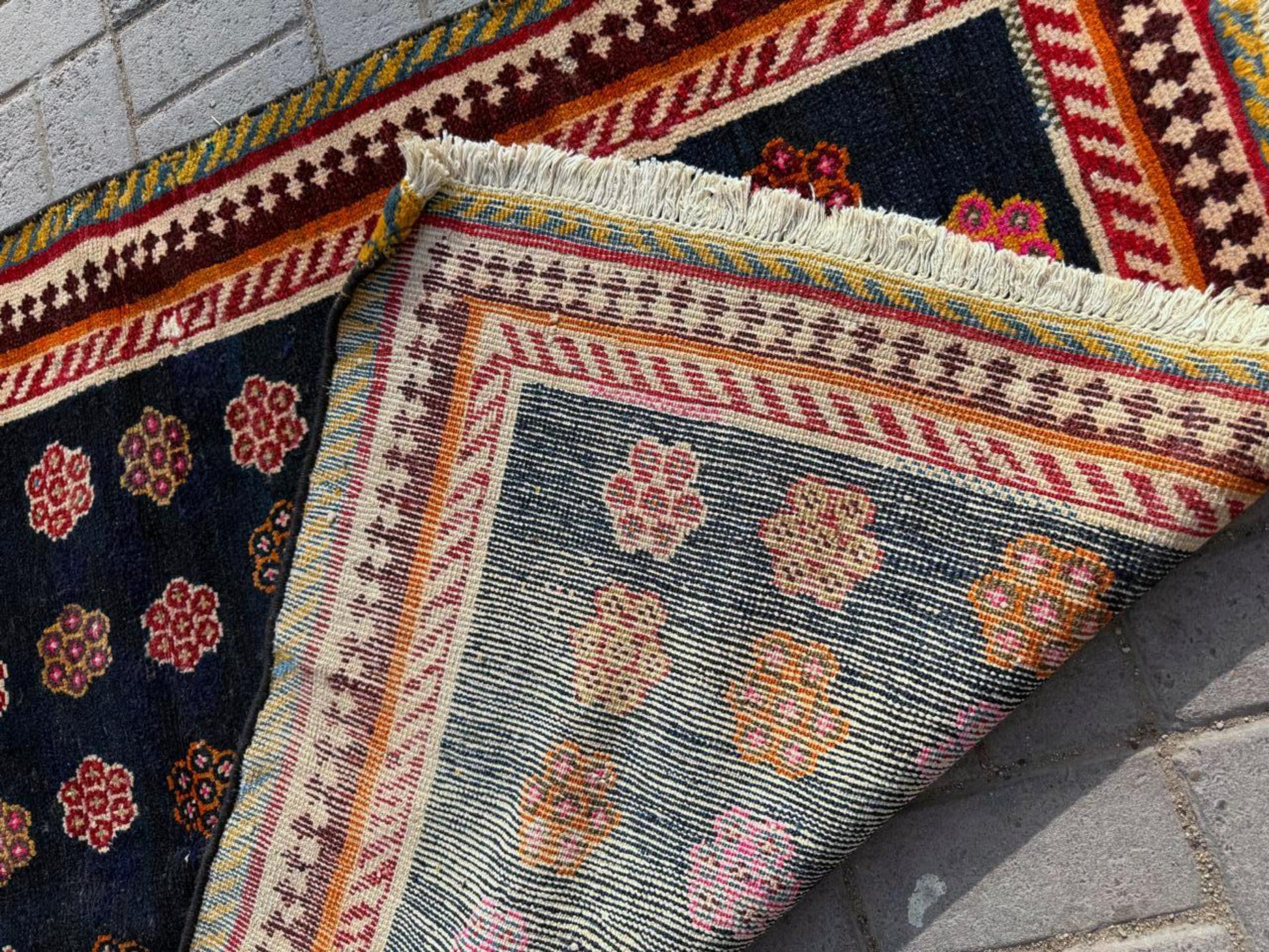 Vibrant fuchsia and orange floral rosettes

