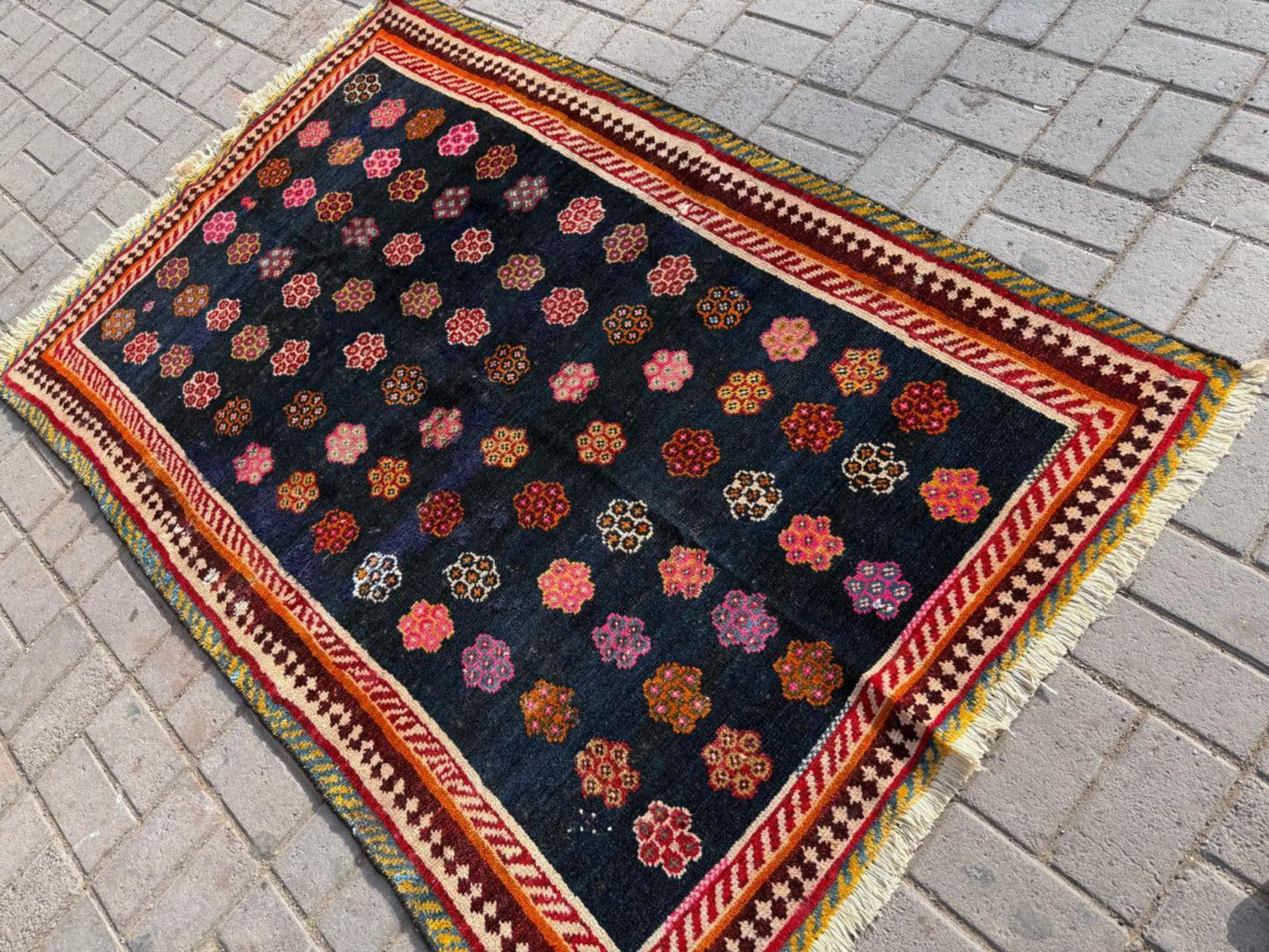 Close-up of intricate tribal medallion details

