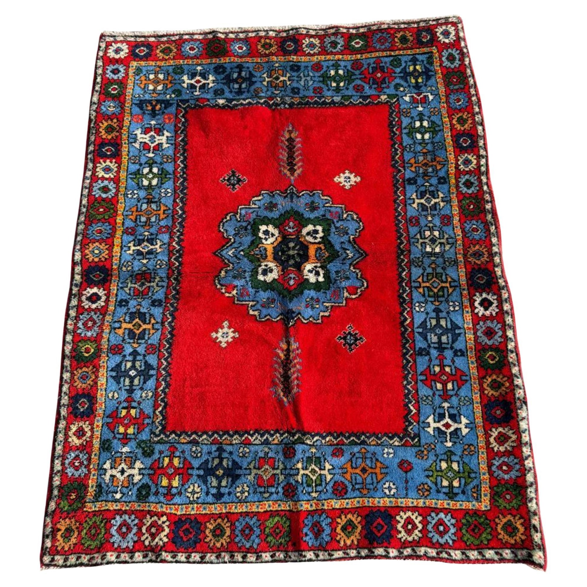 Antique Moroccan Berber rug with geometric medallion

