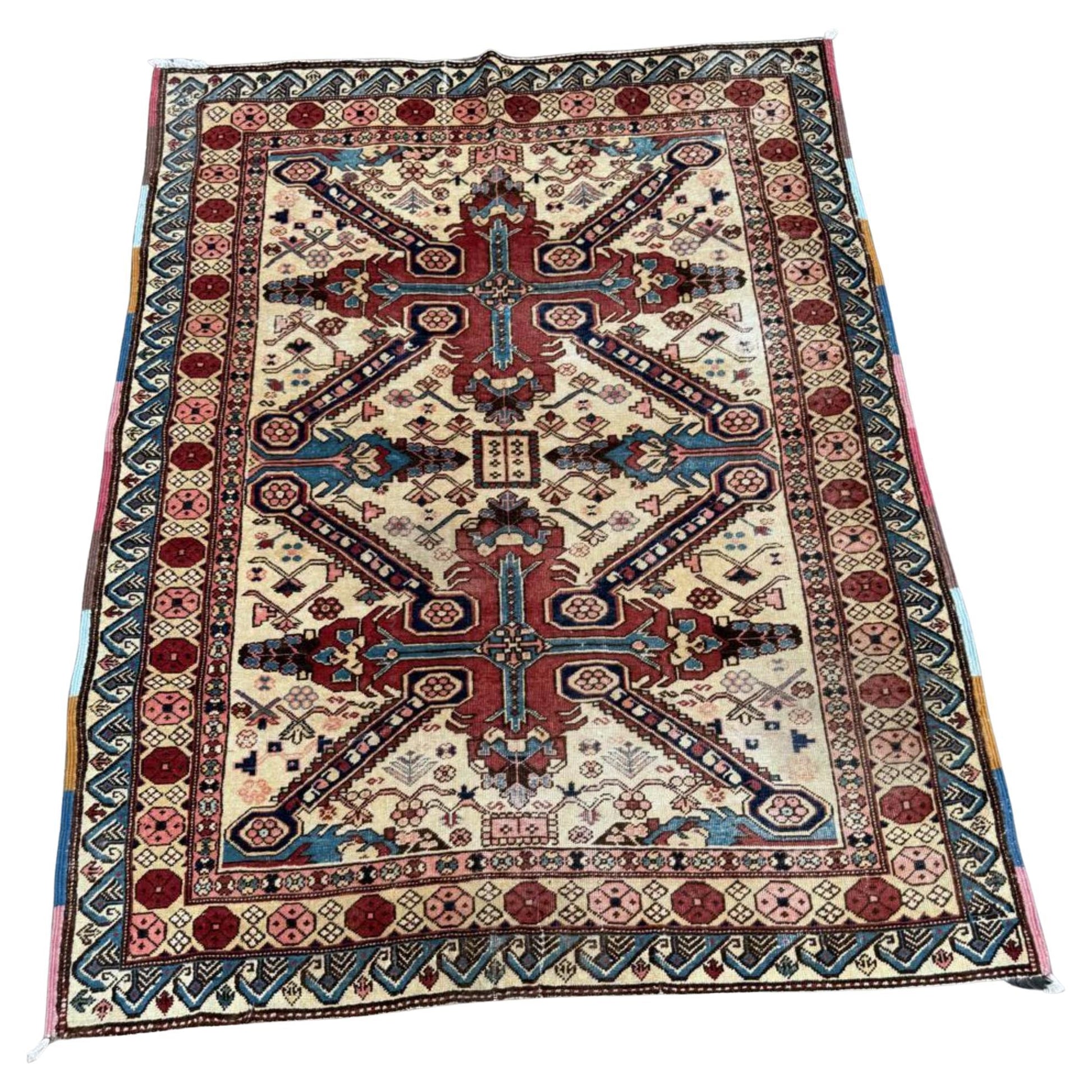 Antique Zeyhur rug with geometric medallions

