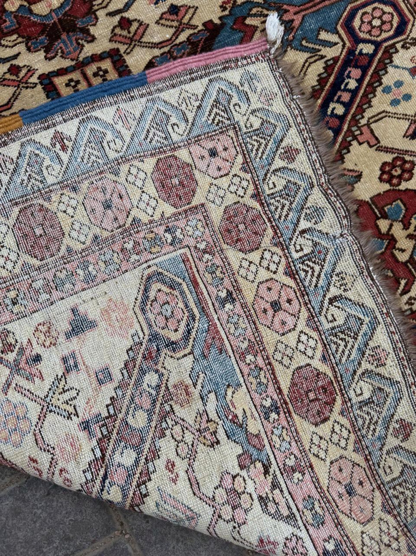 Close-up of intricate tribal medallion details

