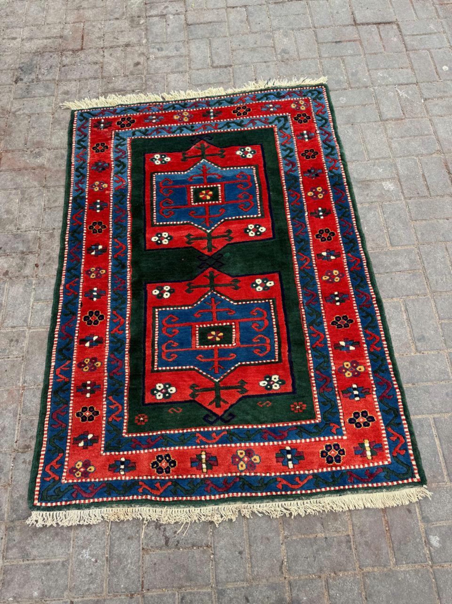 Deep indigo and madder red tribal motifs

