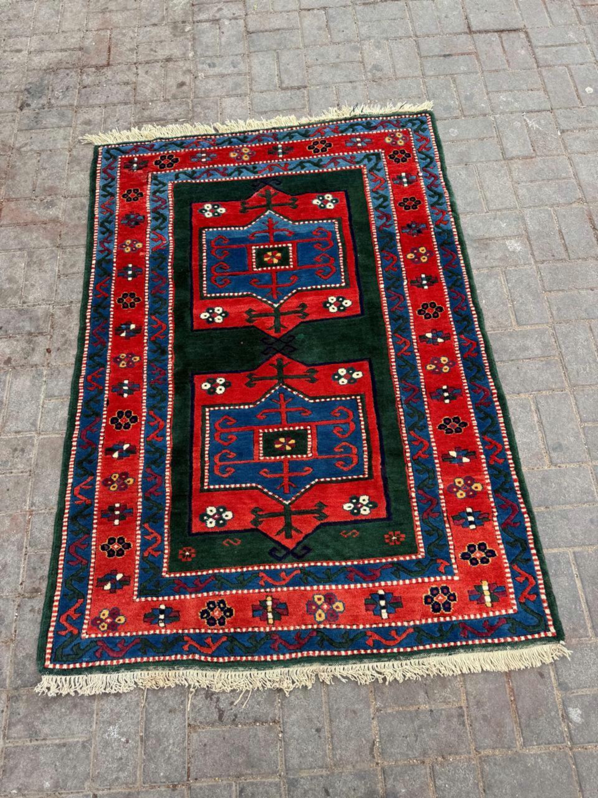 Deep indigo and madder red tribal motifs

