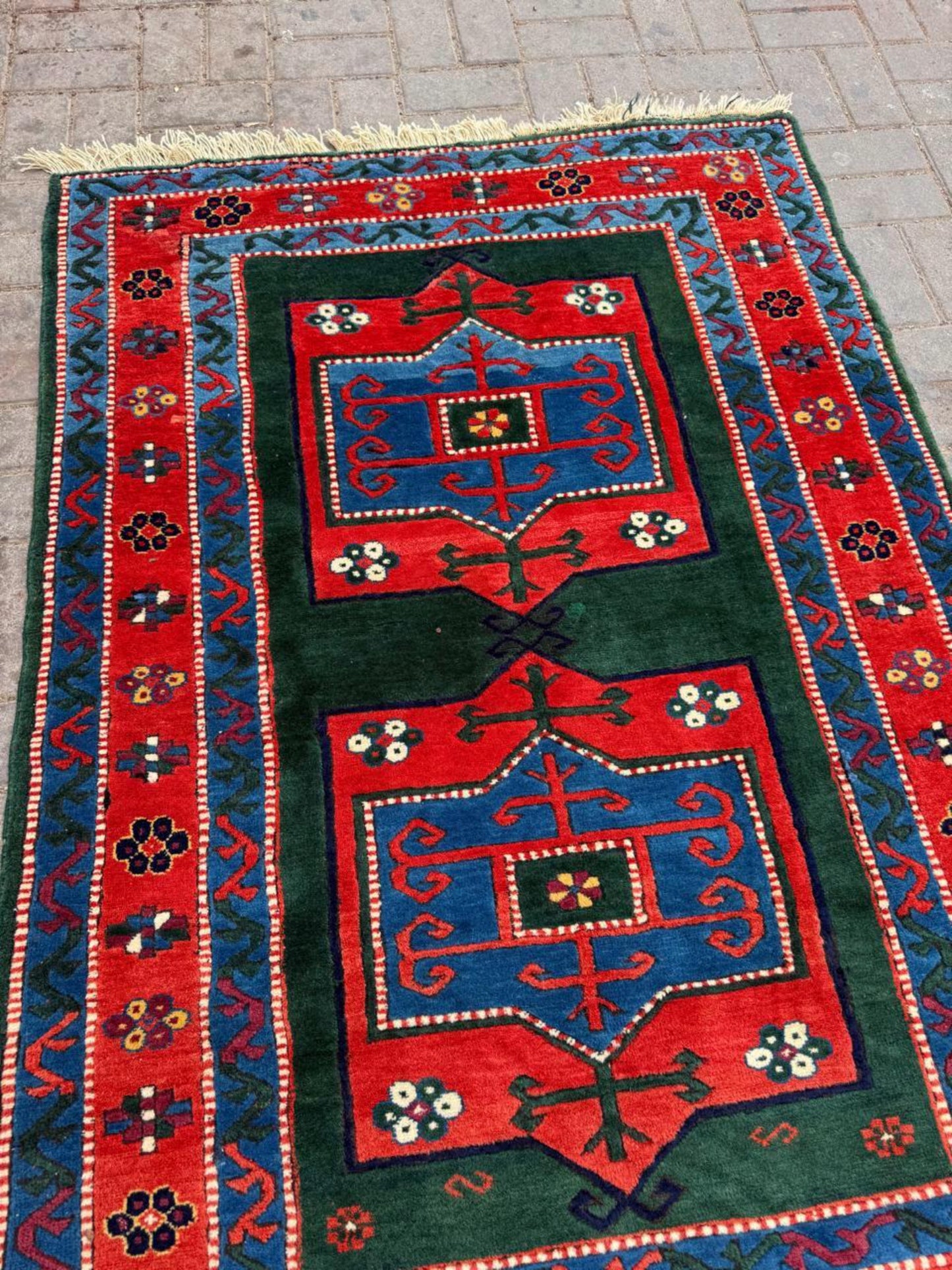 Full rug view showing balanced triple medallion composition

