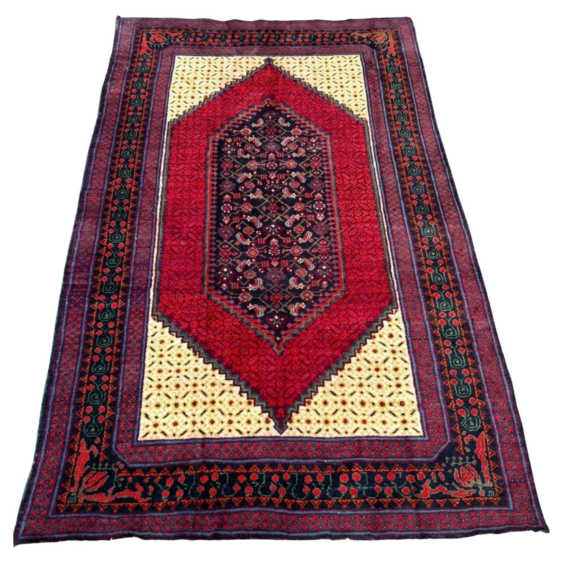 Vintage Kazak rug with central geometric medallion

