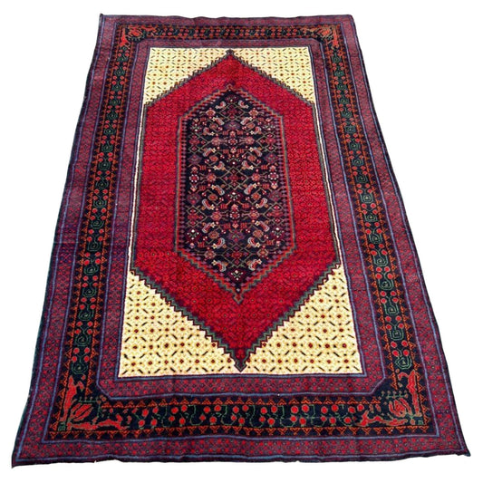 Vintage Kazak rug with central geometric medallion

