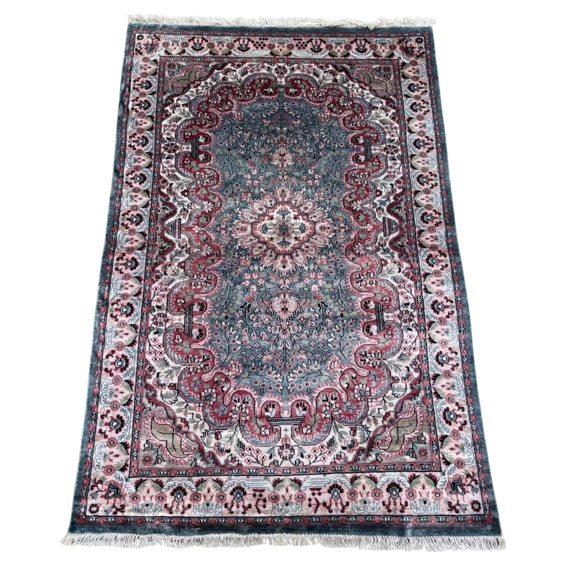 Vintage Kashan silk rug with central floral medallion

