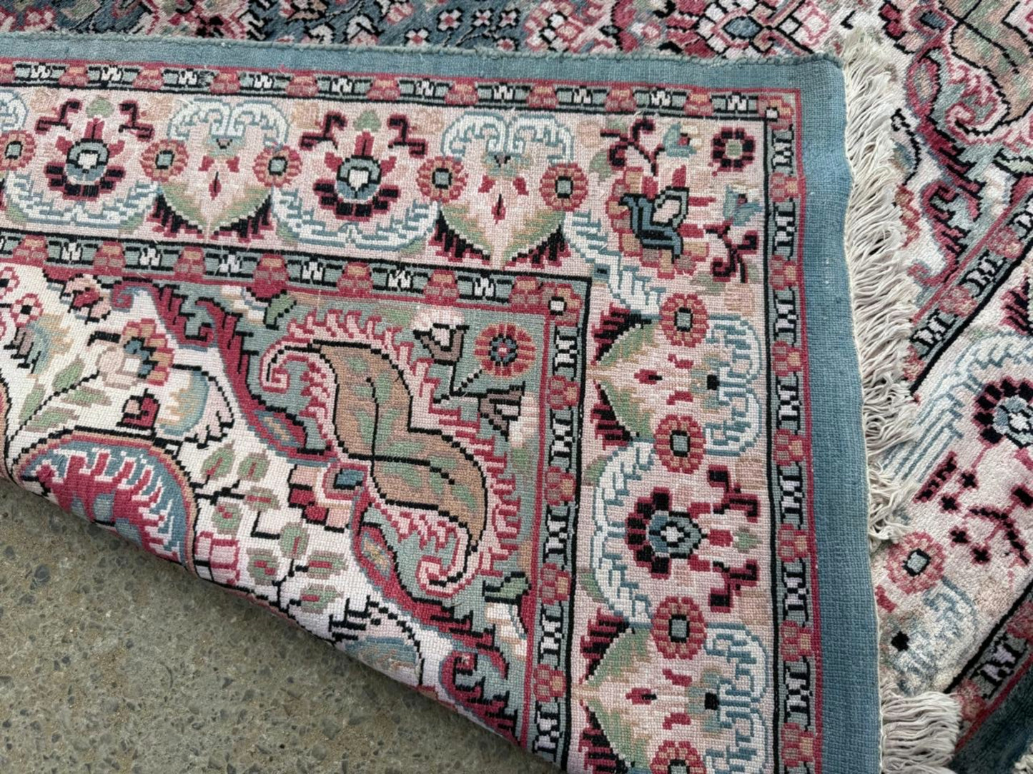 Close-up of silk knotting detail and sheen

