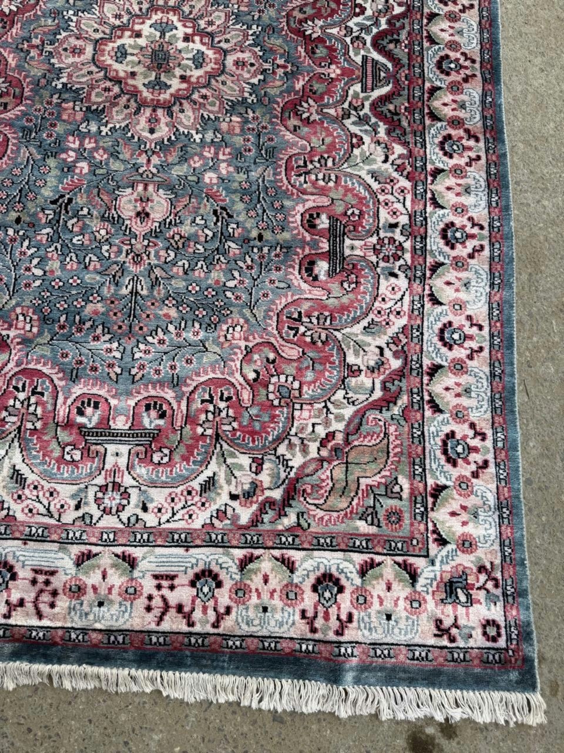 Full rug view showing balanced medallion composition

