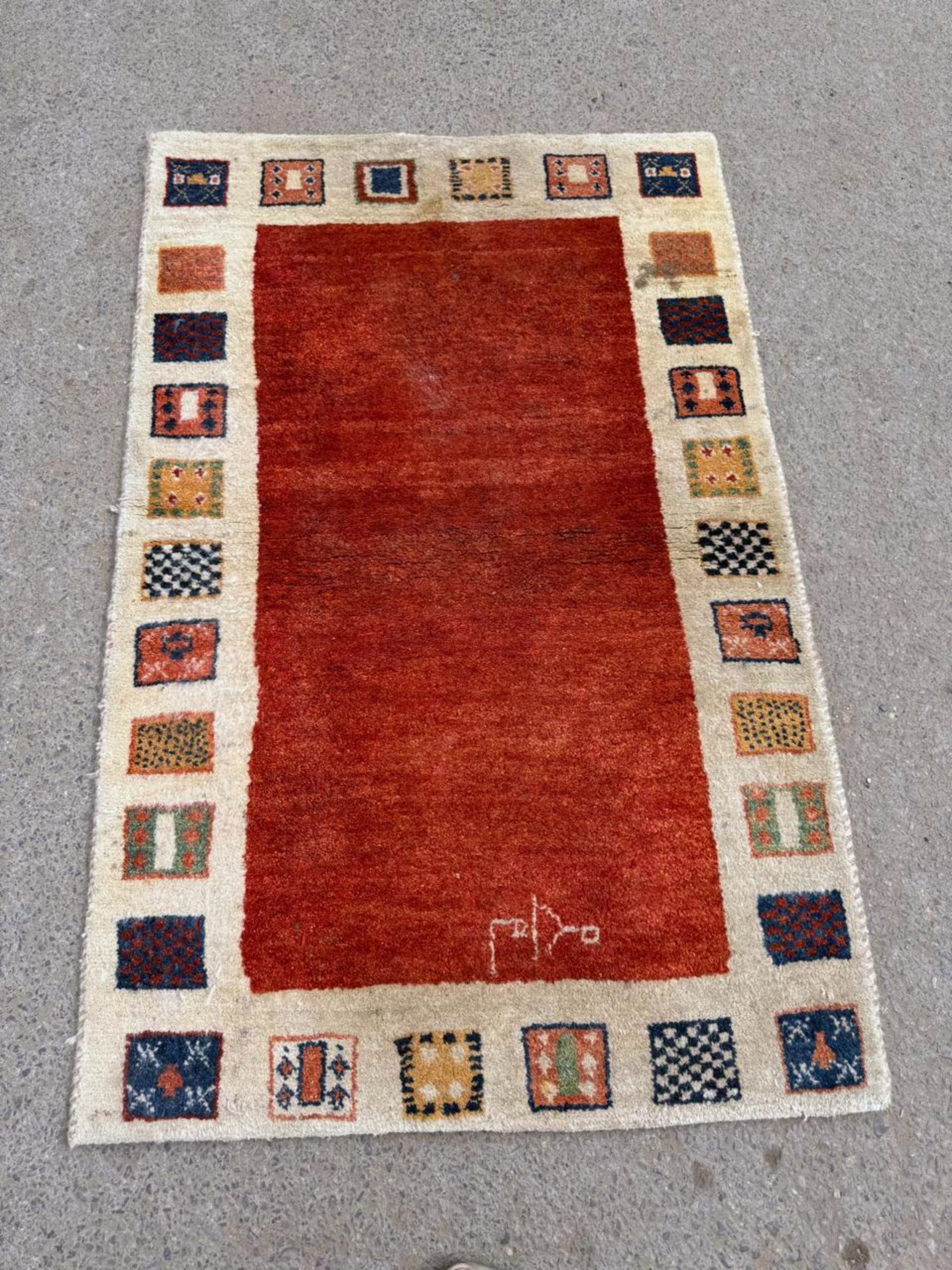 Side profile view showing the rug's substantial depth and sturdy edges.

