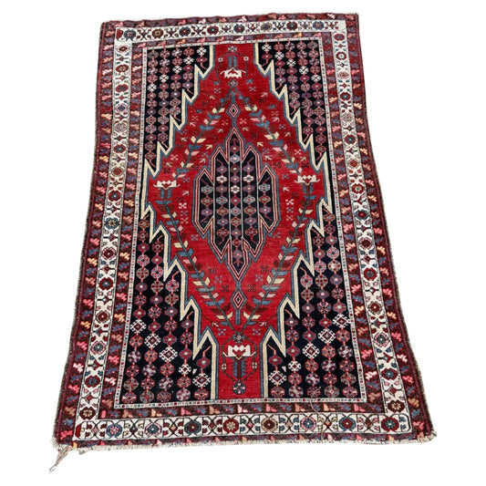Full top view of the antique Persian Mazlaghan rug showing the complete all-over Herati pattern.

