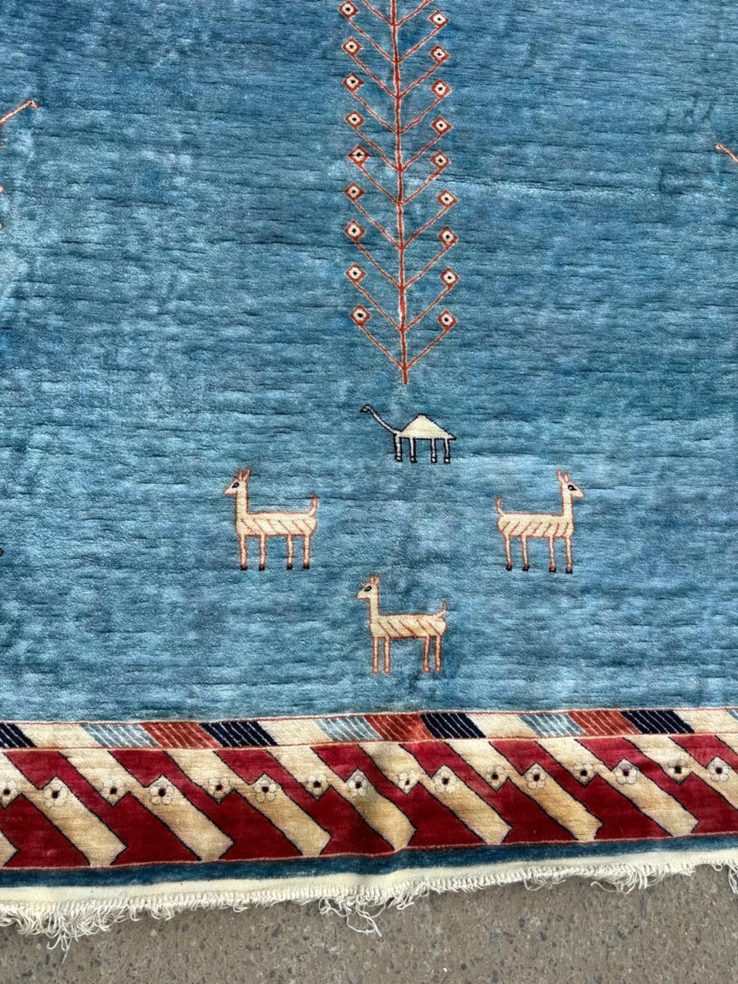 View of the rug's multiple borders, showcasing their architectural progression.

