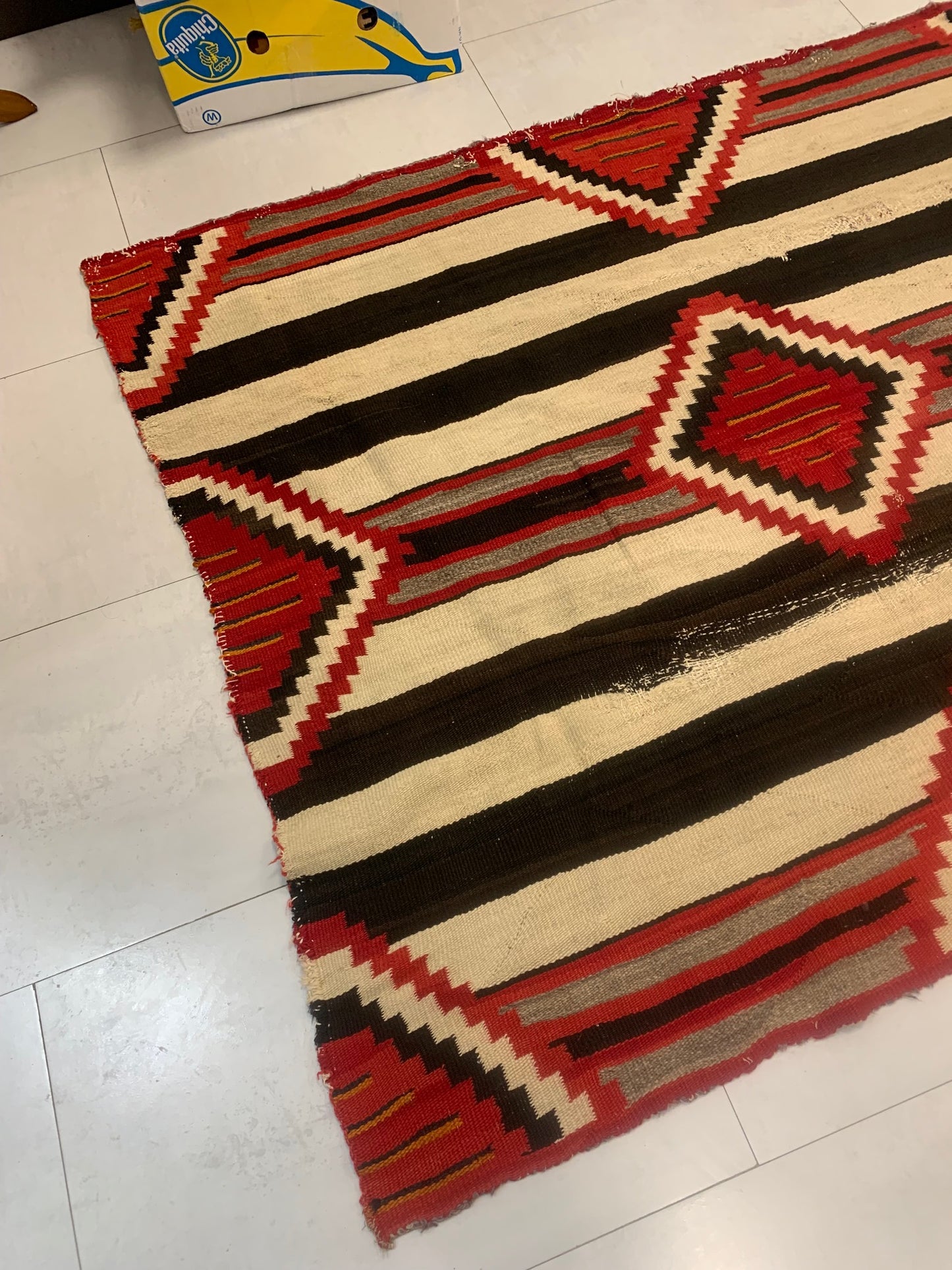 Warm and Earthy Red Dominant Color with Black and Cream Accents on Antique Navajo Rug - 1880s
