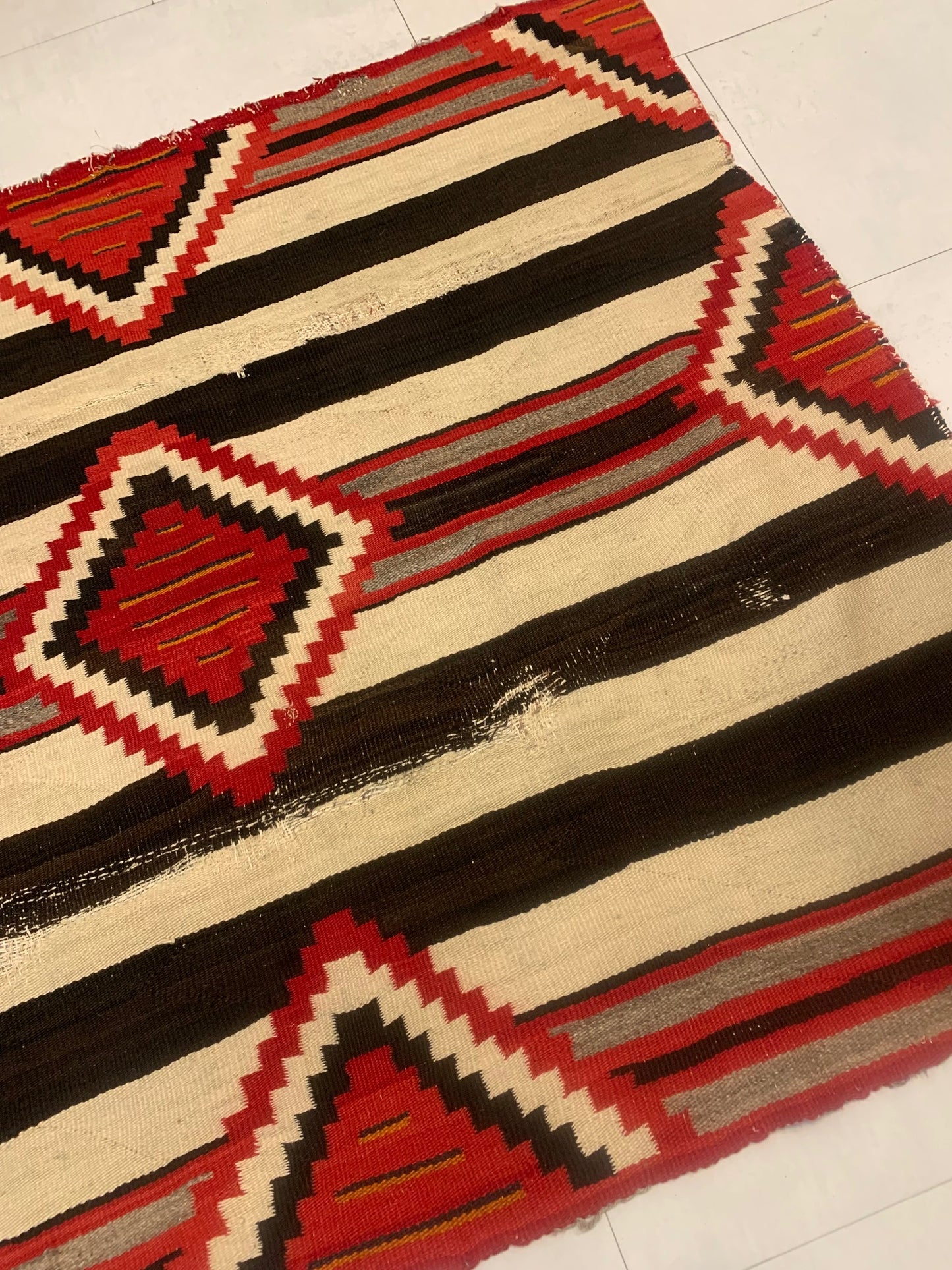 Bold Geometric Patterns including Stripes and Diamonds on Handcrafted American Navajo Rug - 1880s