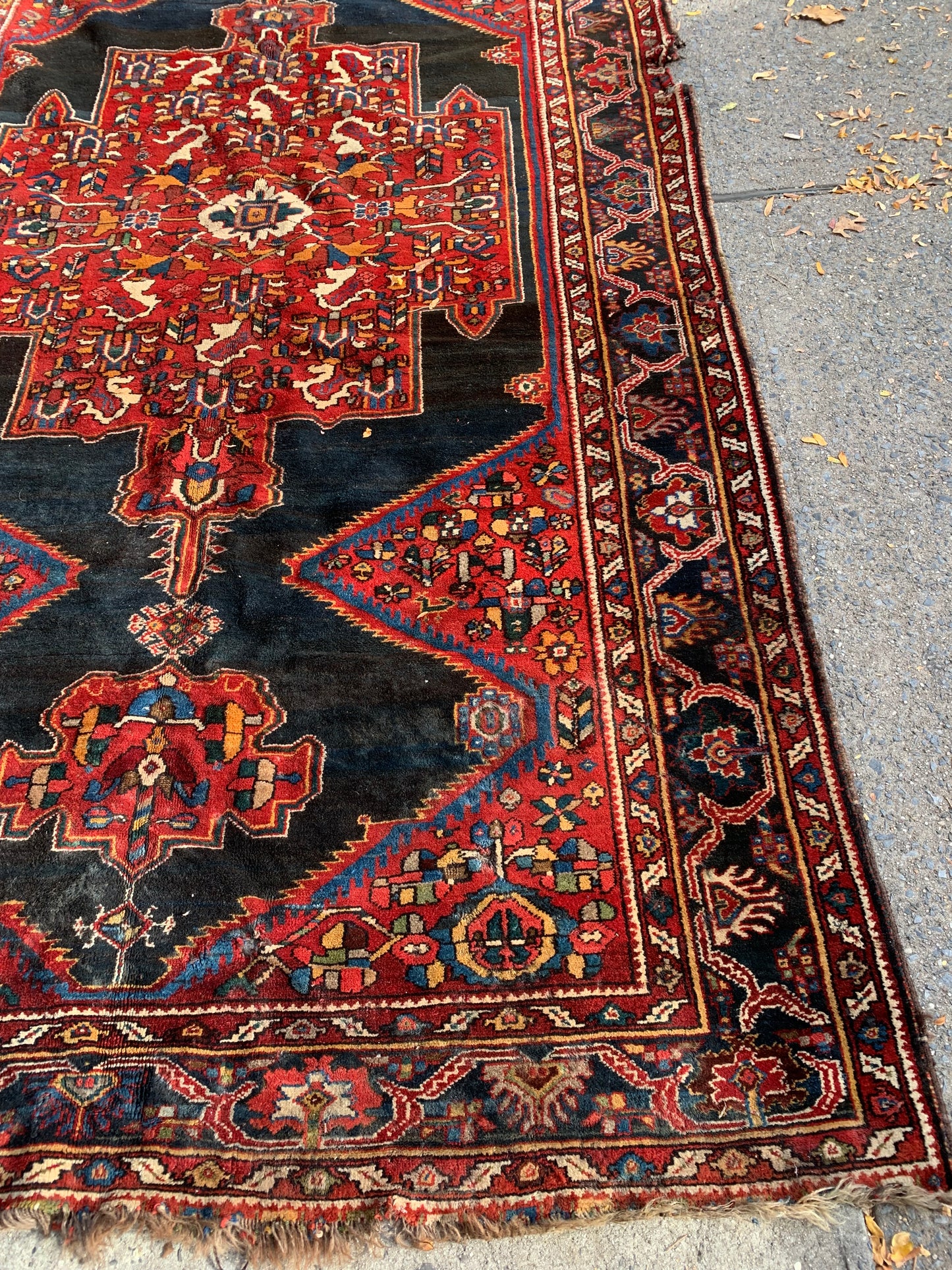 Antique wool rug with natural patina and authentic charm.
