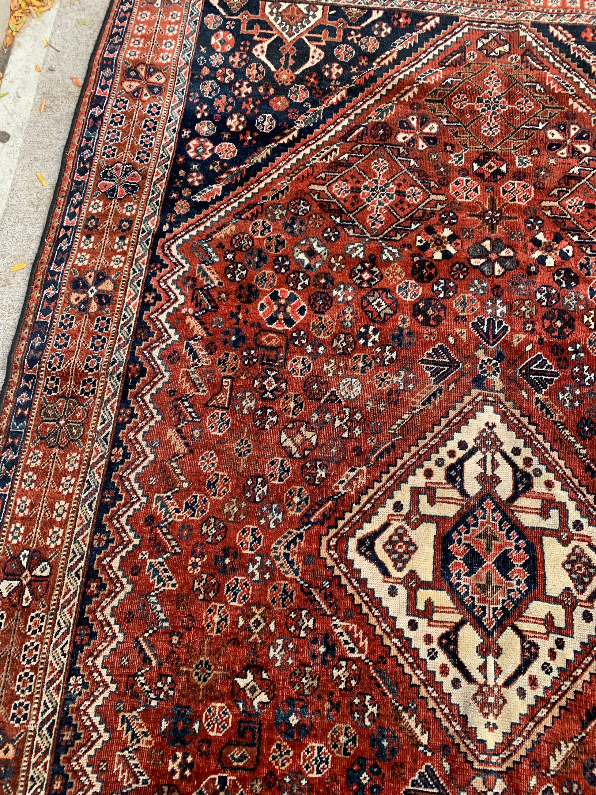 Multi-layered borders of a Persian Qashqai tribal rug.
