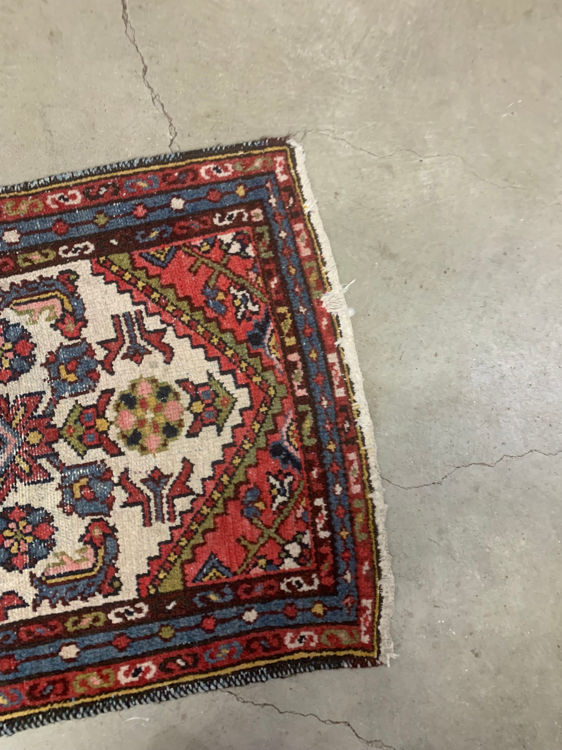 Handwoven wool Persian rug with natural dyes.
