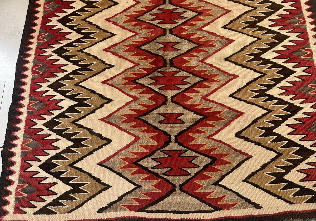 Close-up of Geometric Pattern on Navajo Rug

