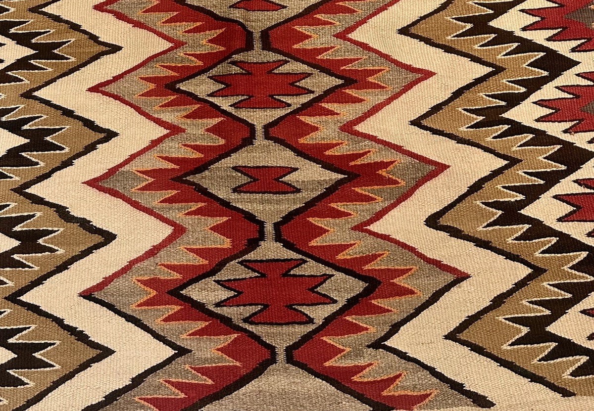 Red, Beige, Brown, and Black Colors in Navajo Rug

