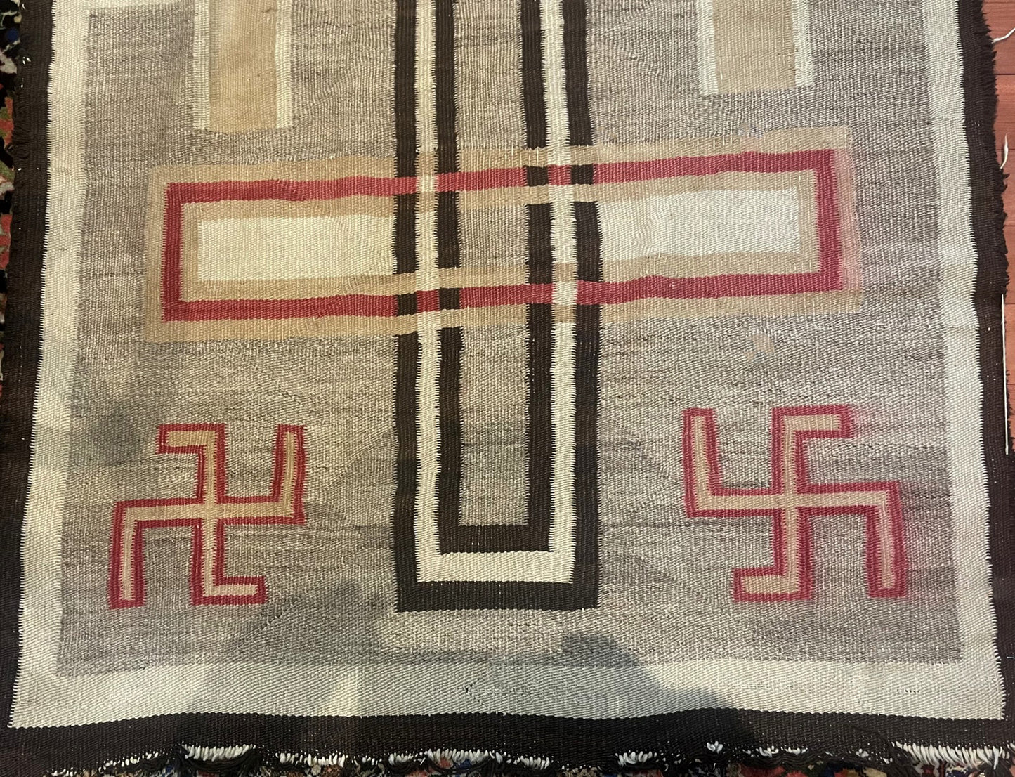 Shot focusing on the smaller geometric shapes in shades of brown and beige.

