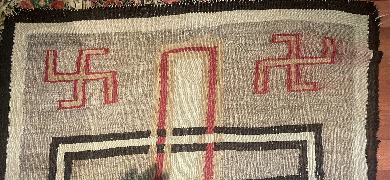 Close-up of the border design with its traditional geometric motifs.


