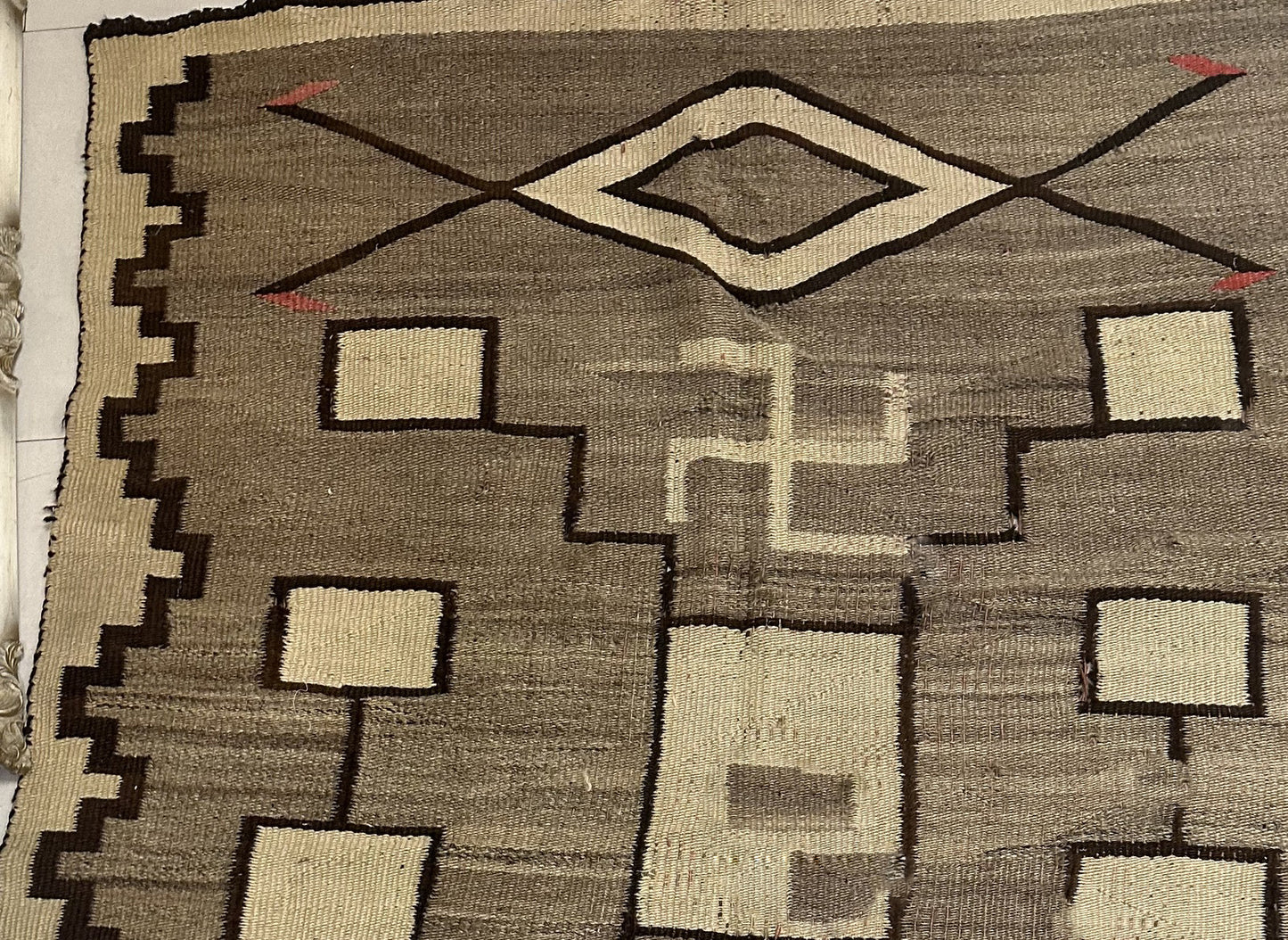 Shot focusing on the smaller geometric shapes in shades of brown and beige.

