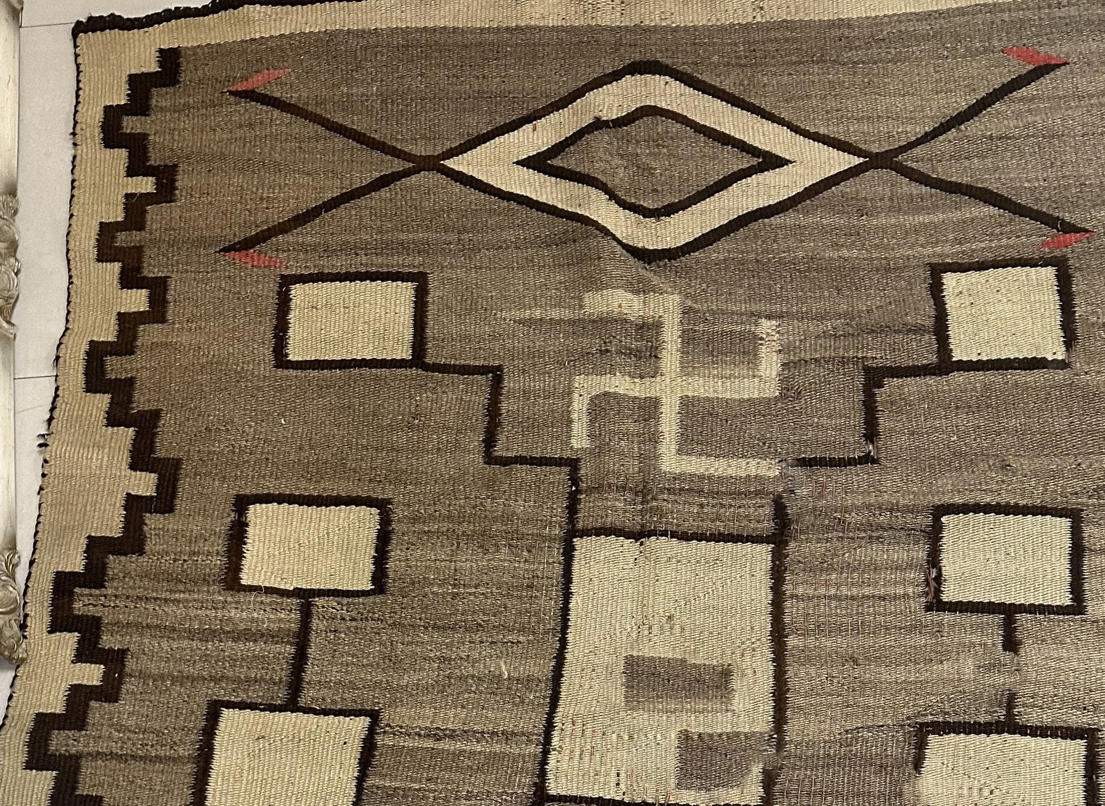 Shot focusing on the smaller geometric shapes in shades of brown and beige.


