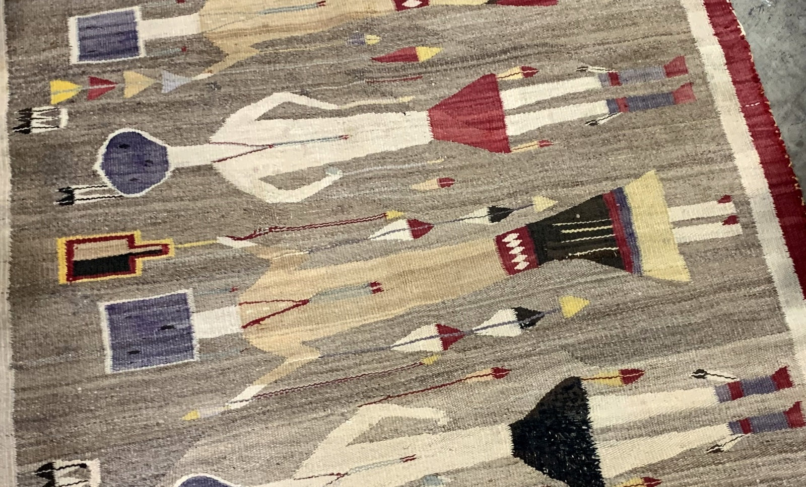 Early 1900s Native American wool rug with spiritual designs

