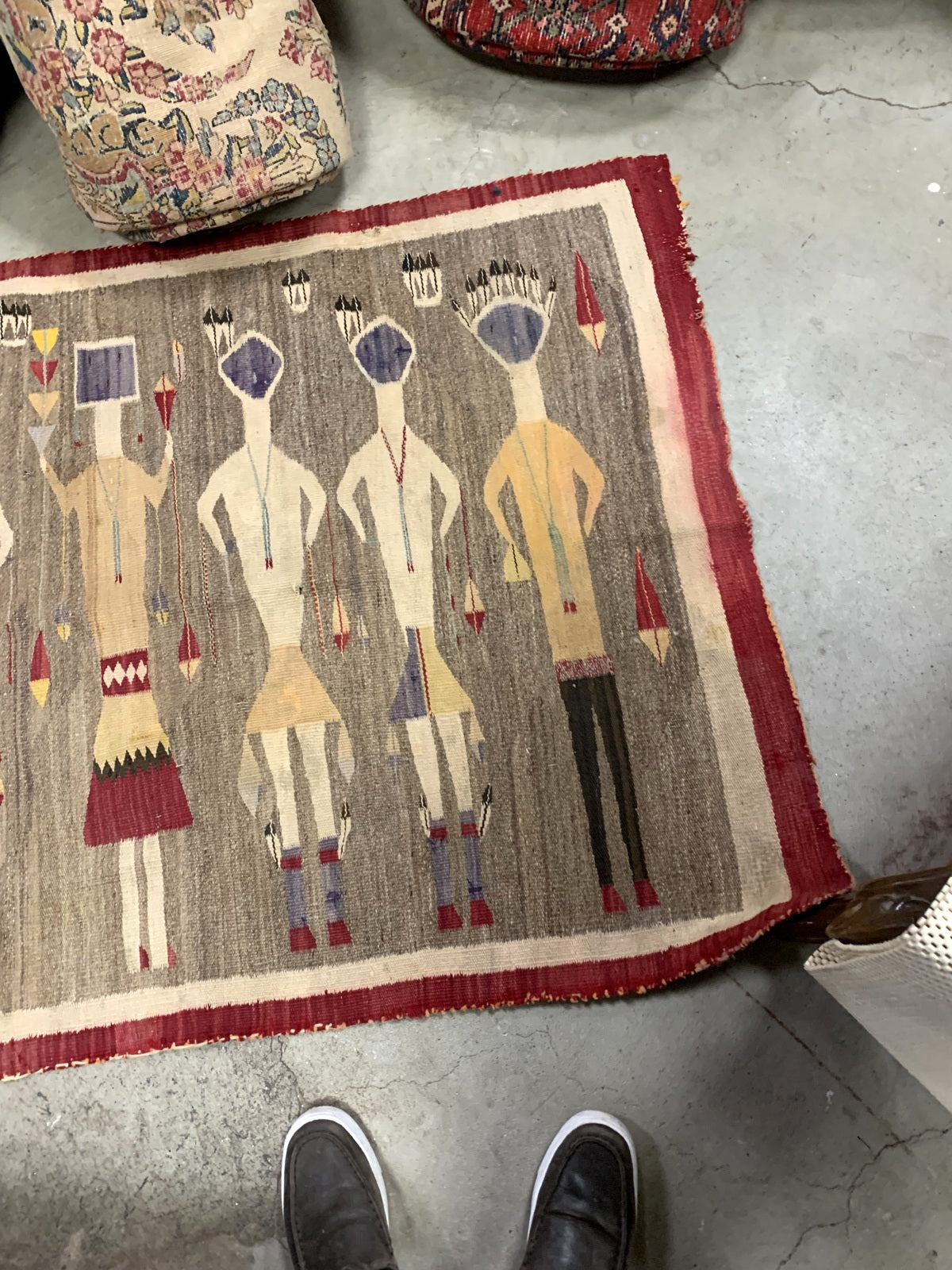 Handwoven antique rug showcasing traditional Navajo weaving techniques

