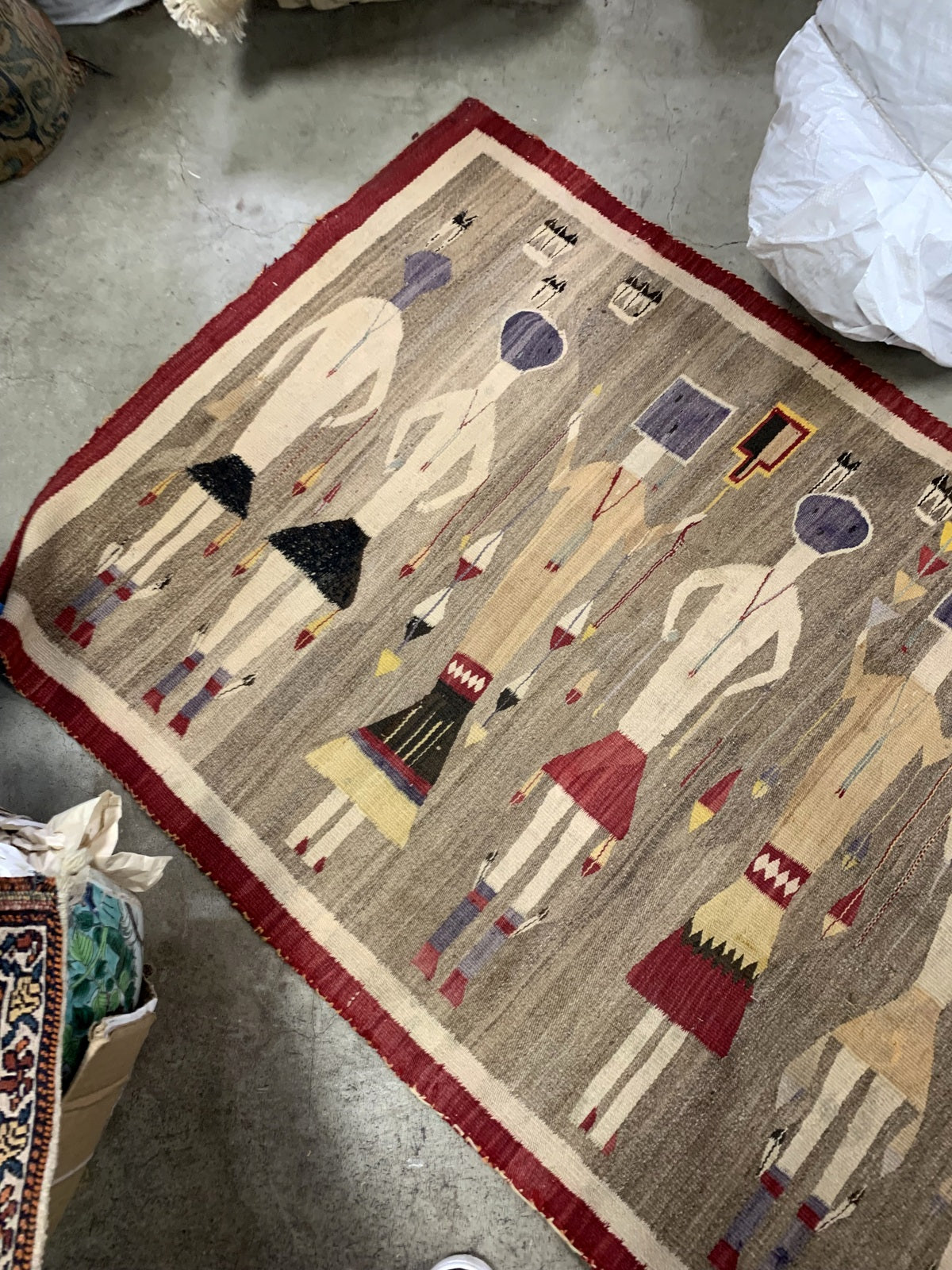 Antique Navajo textile with cultural and historical significance
