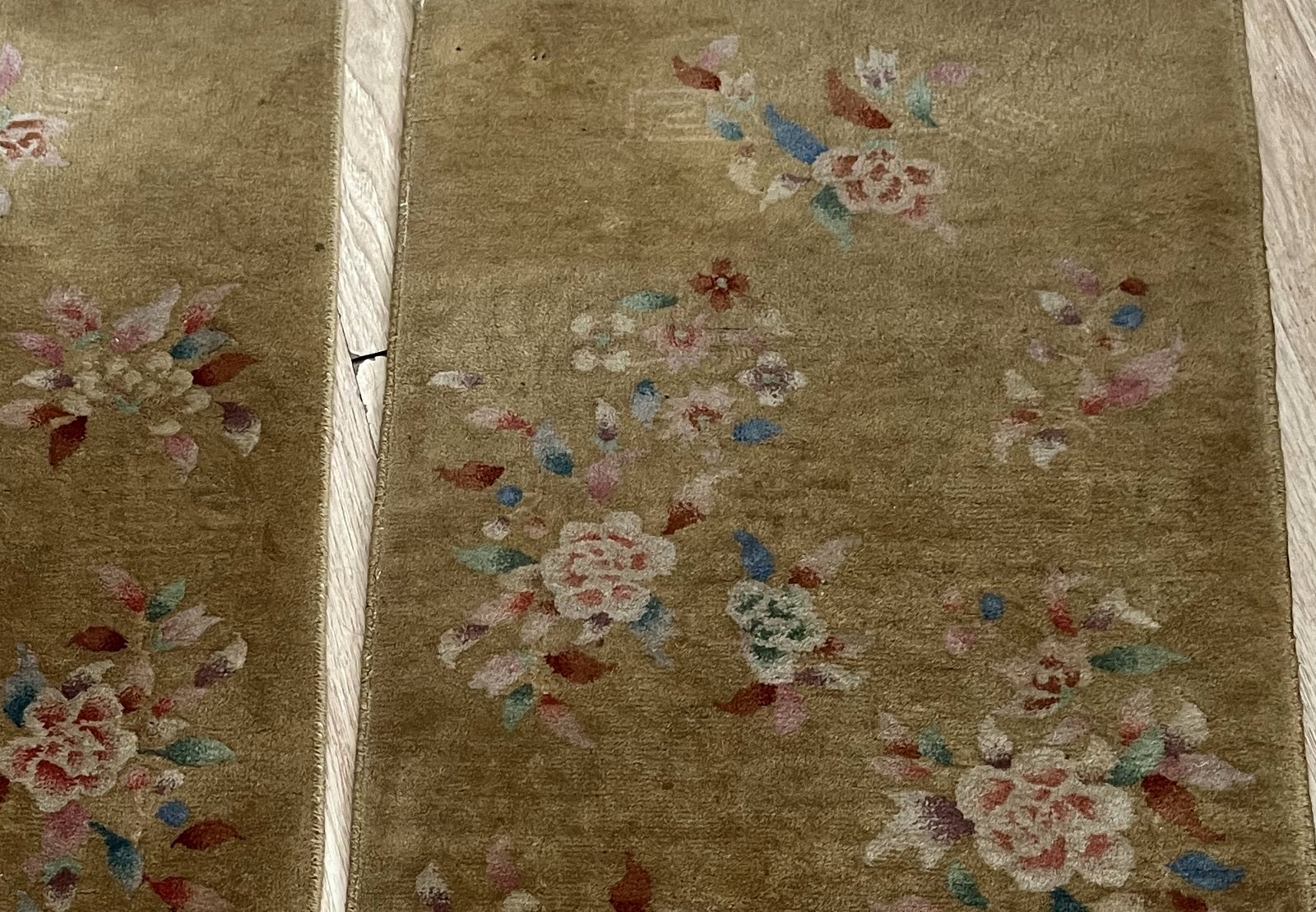 Antique Art Deco rugs in earthy tones and refined patterns
