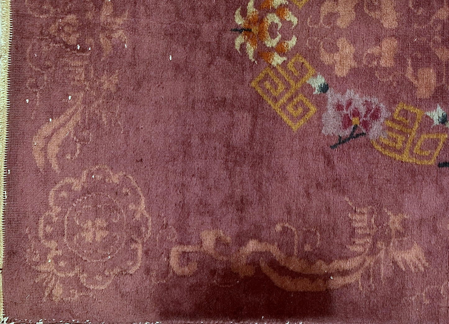 Close-up of handwoven wool on antique Chinese Art Deco rug
