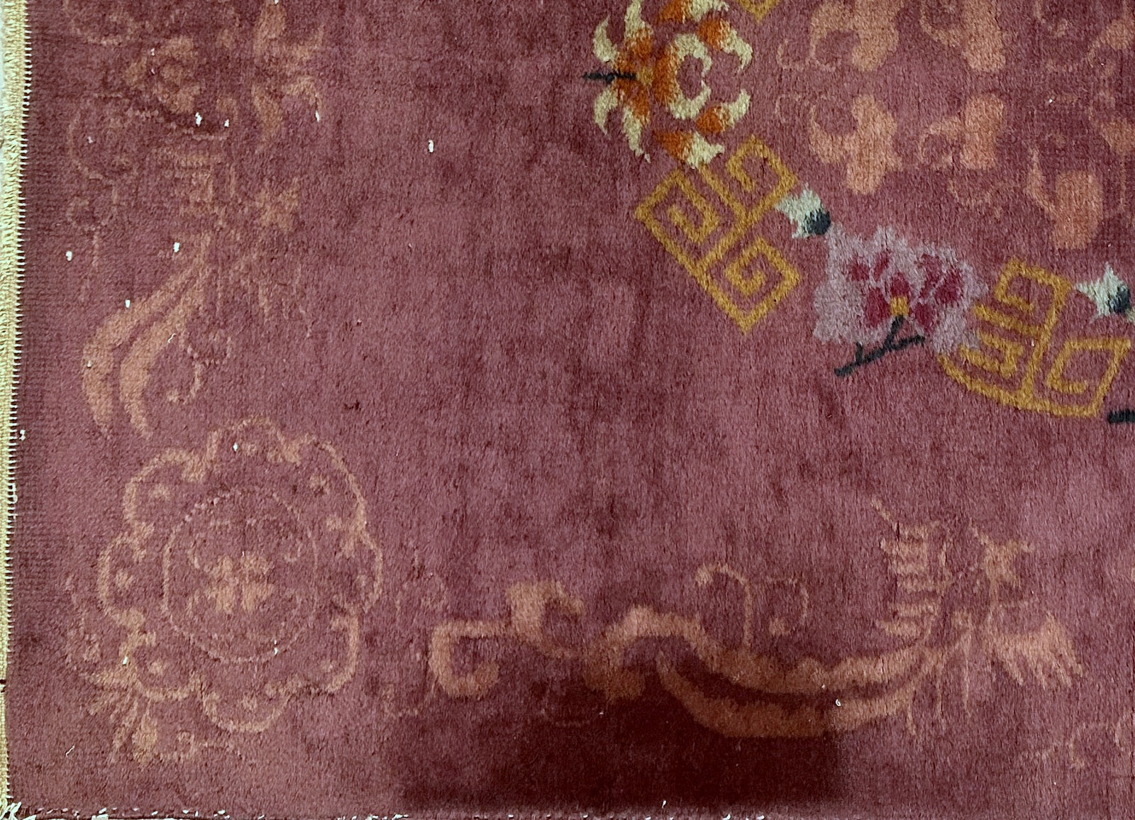 Close-up of handwoven wool on antique Chinese Art Deco rug
