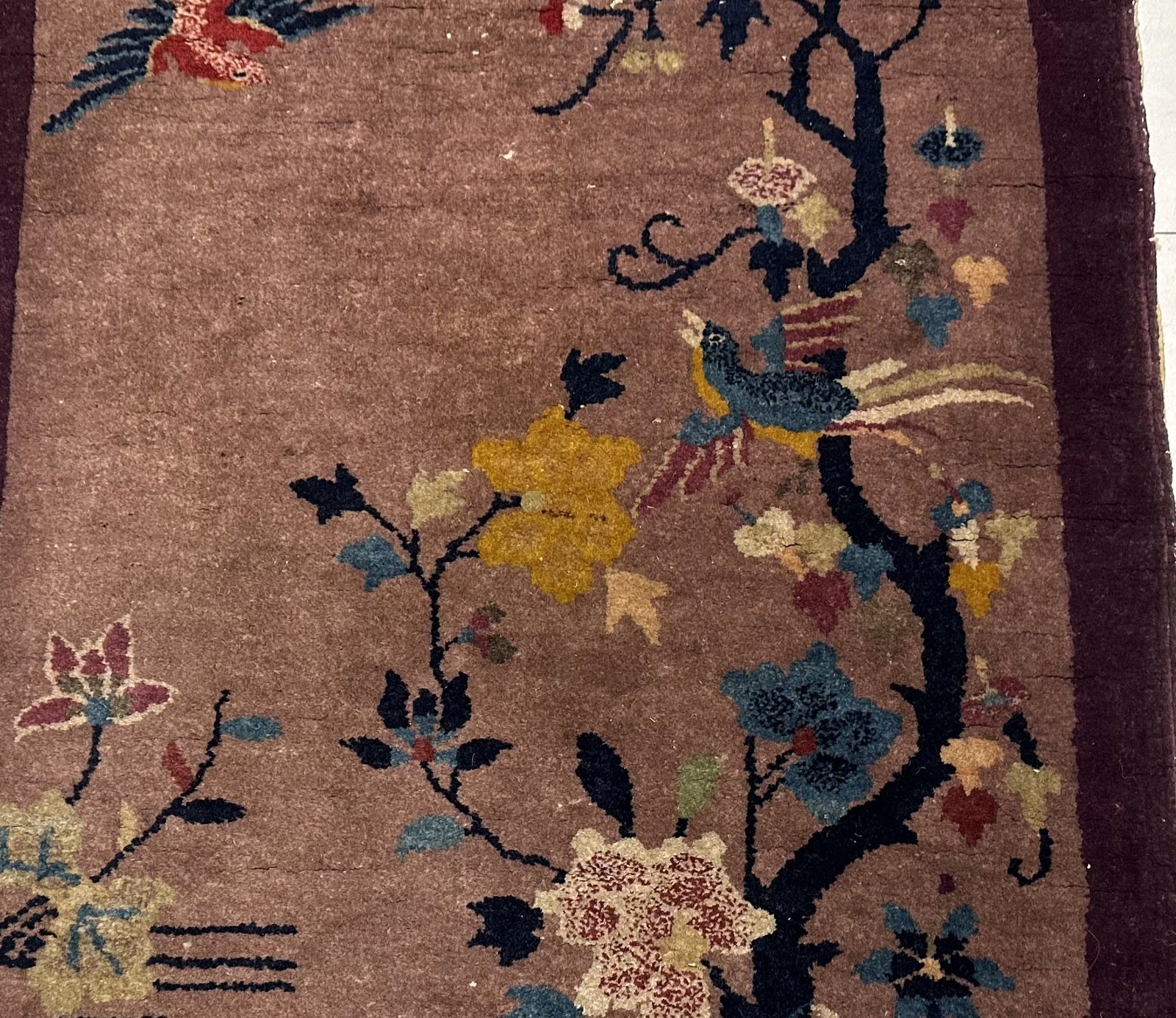 Handwoven vintage Art Deco Chinese rug with cultural significance
