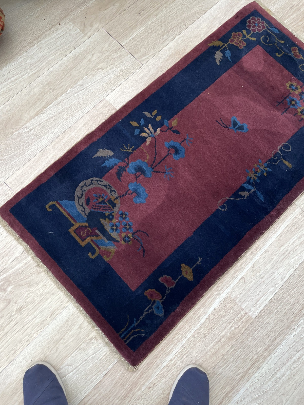 Full layout of the rug showing the indigo blue border.

