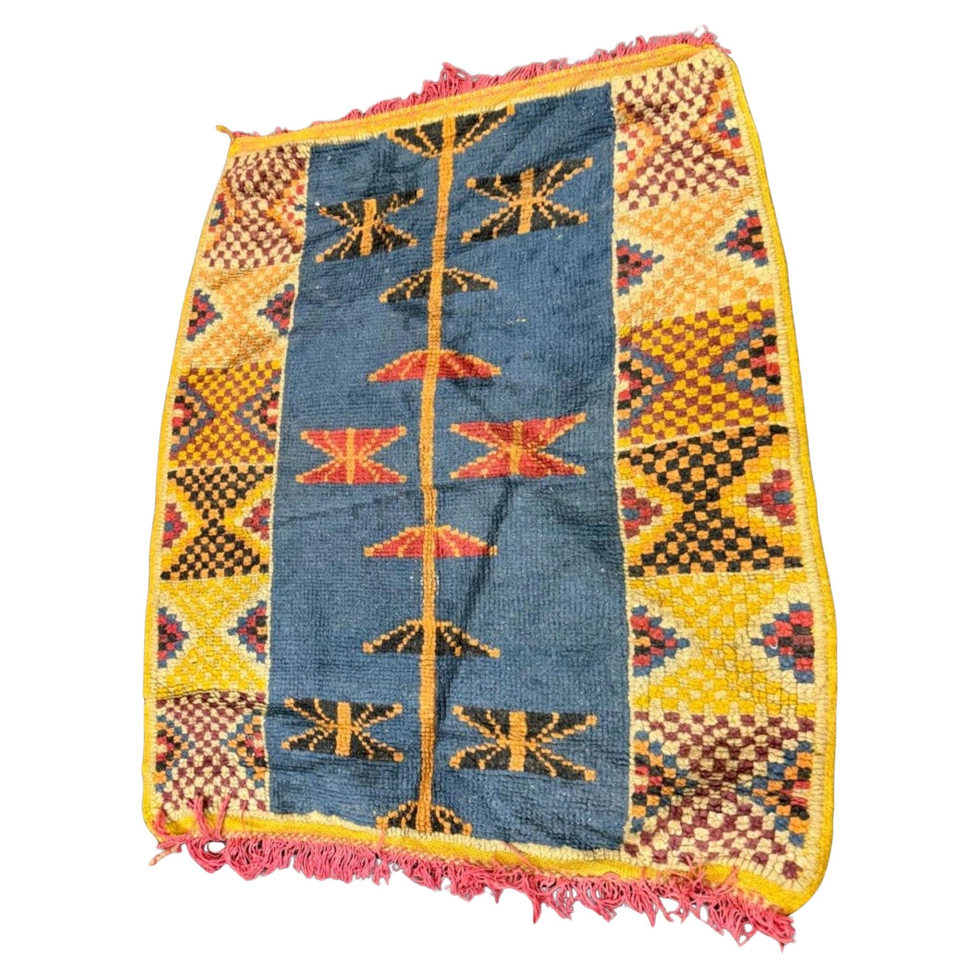 Antique Moroccan Berber rug with a strong teal blue field.

