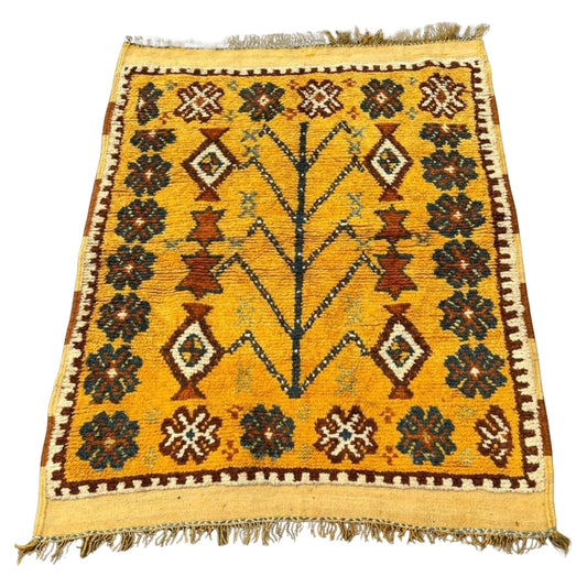Antique Moroccan Berber rug with a brilliant sunny yellow field.

