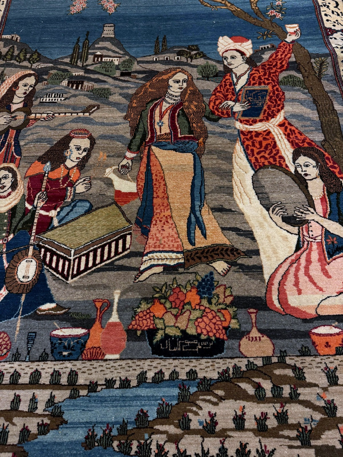 Full rug view showing sky blue field and composition


