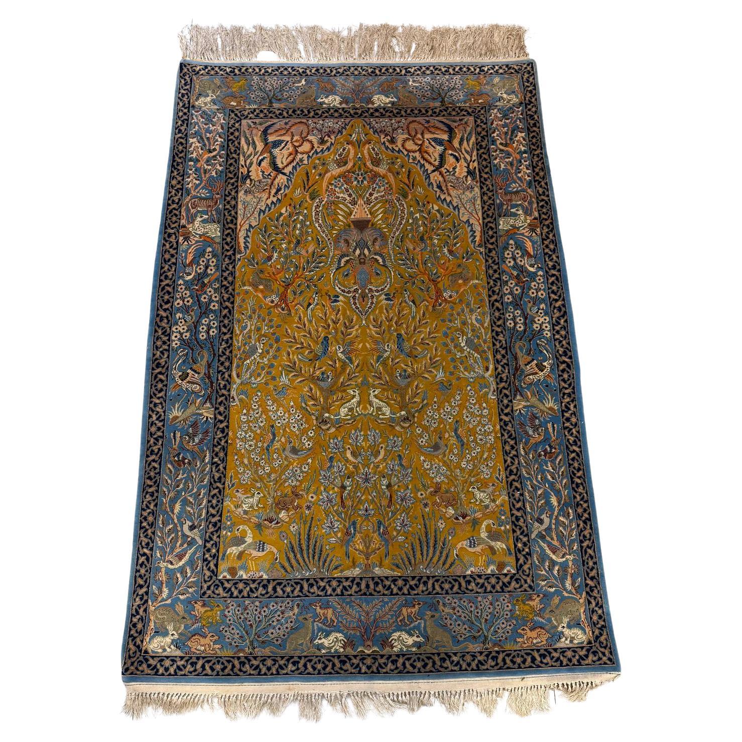 Antique Isfahan Tree of Life rug with bird motifs

